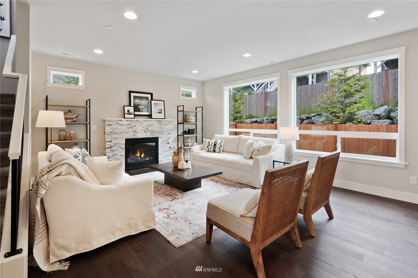 1228 197th Place Southeast Bothell, WA 98012 - Photo 4 of 34 a living room with furniture fireplace and a large window