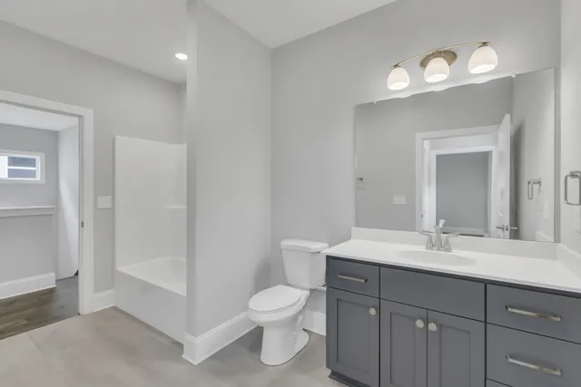 a view of balcony with wooden floor