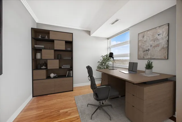 a view of a workspace with furniture