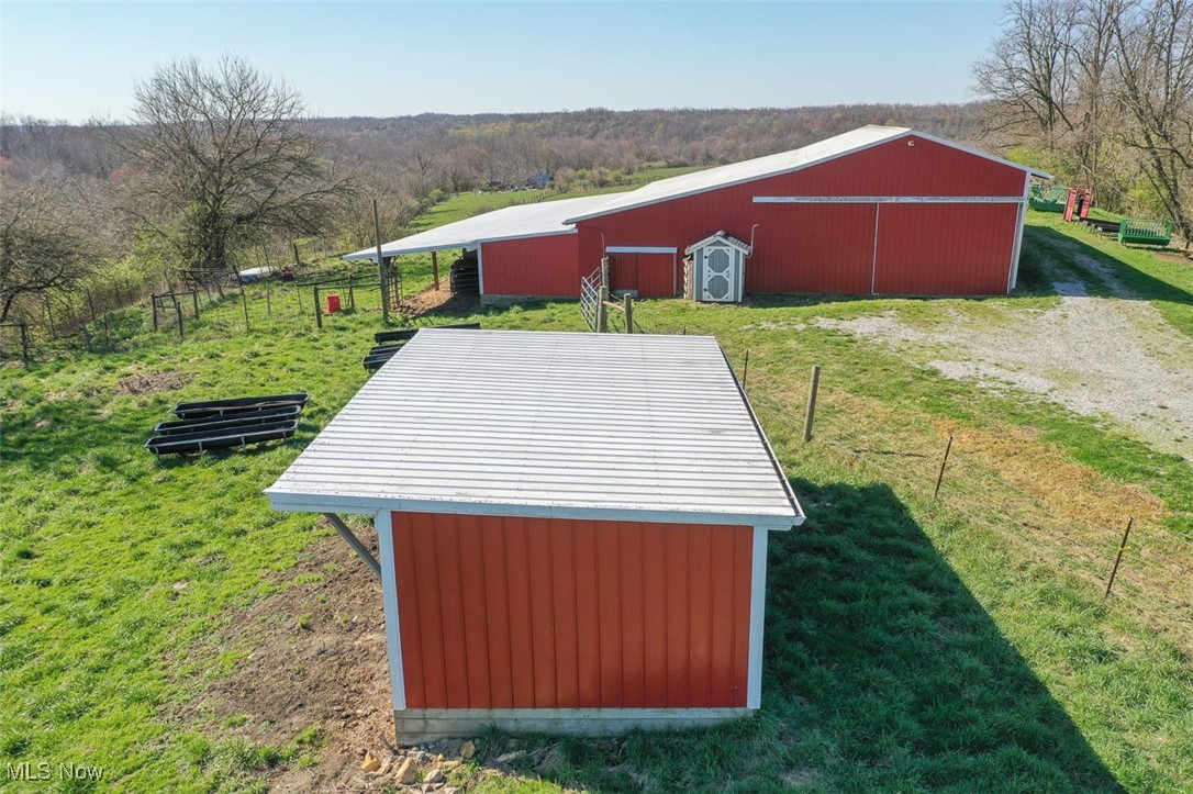 45559 Old Hopedale Road Cadiz, OH 43907 - Photo 7 of 26 View of pole building with a wooded view