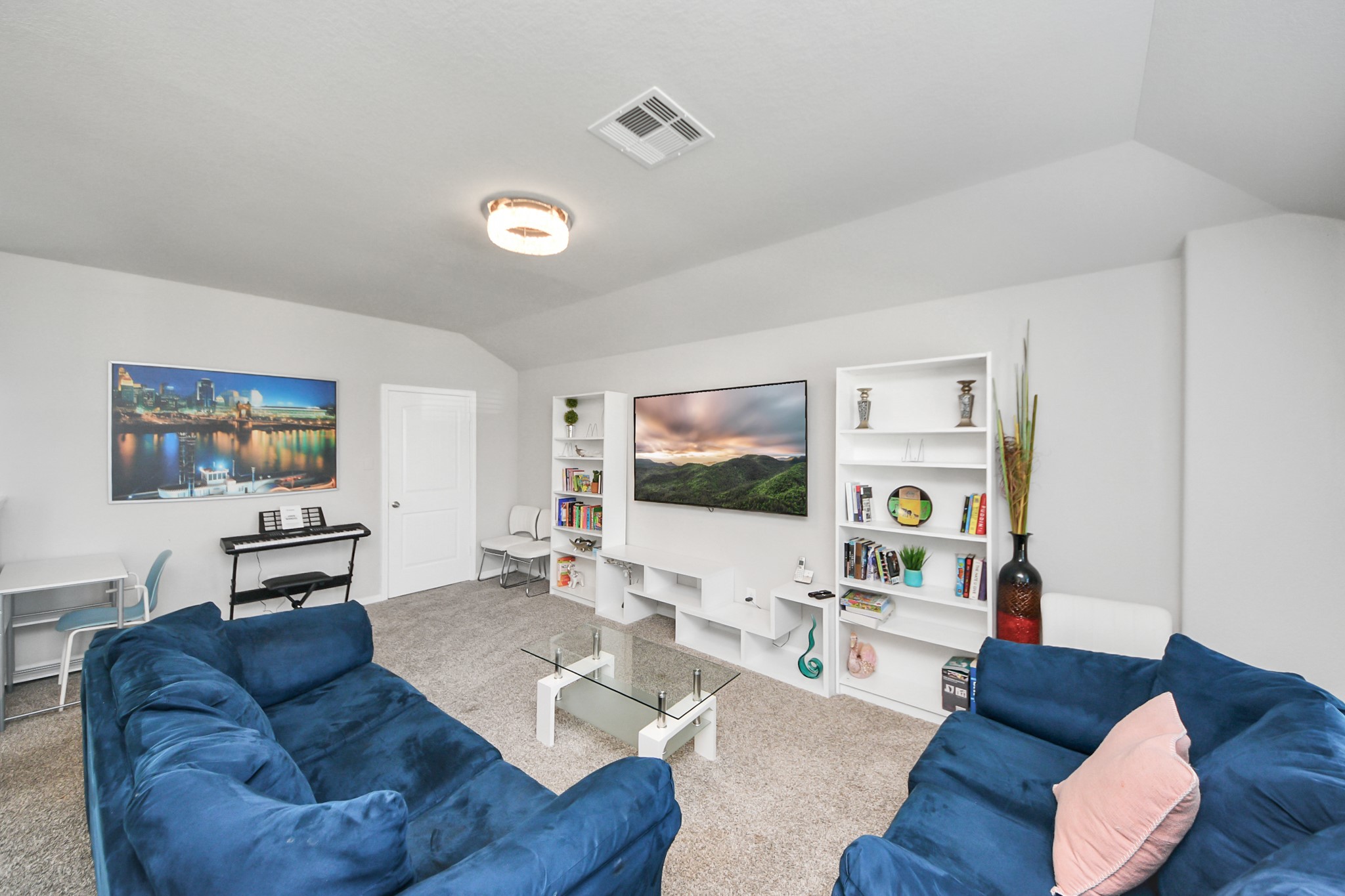 3514 Windham Way Katy, TX 77494 - Photo 9 of 42 a living room with furniture and a flat screen tv