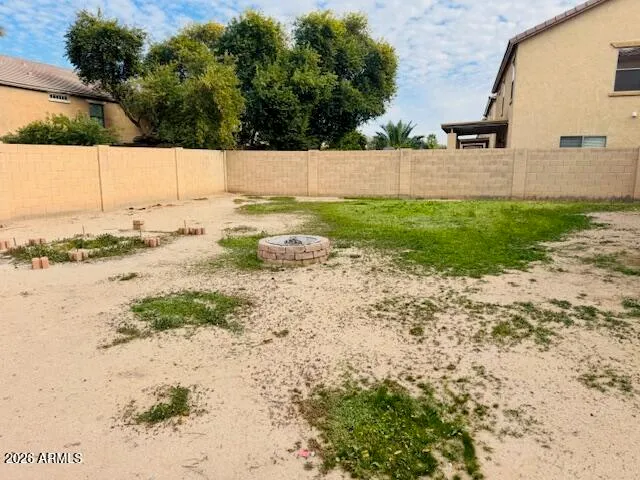 a view of a yard with an outdoor space