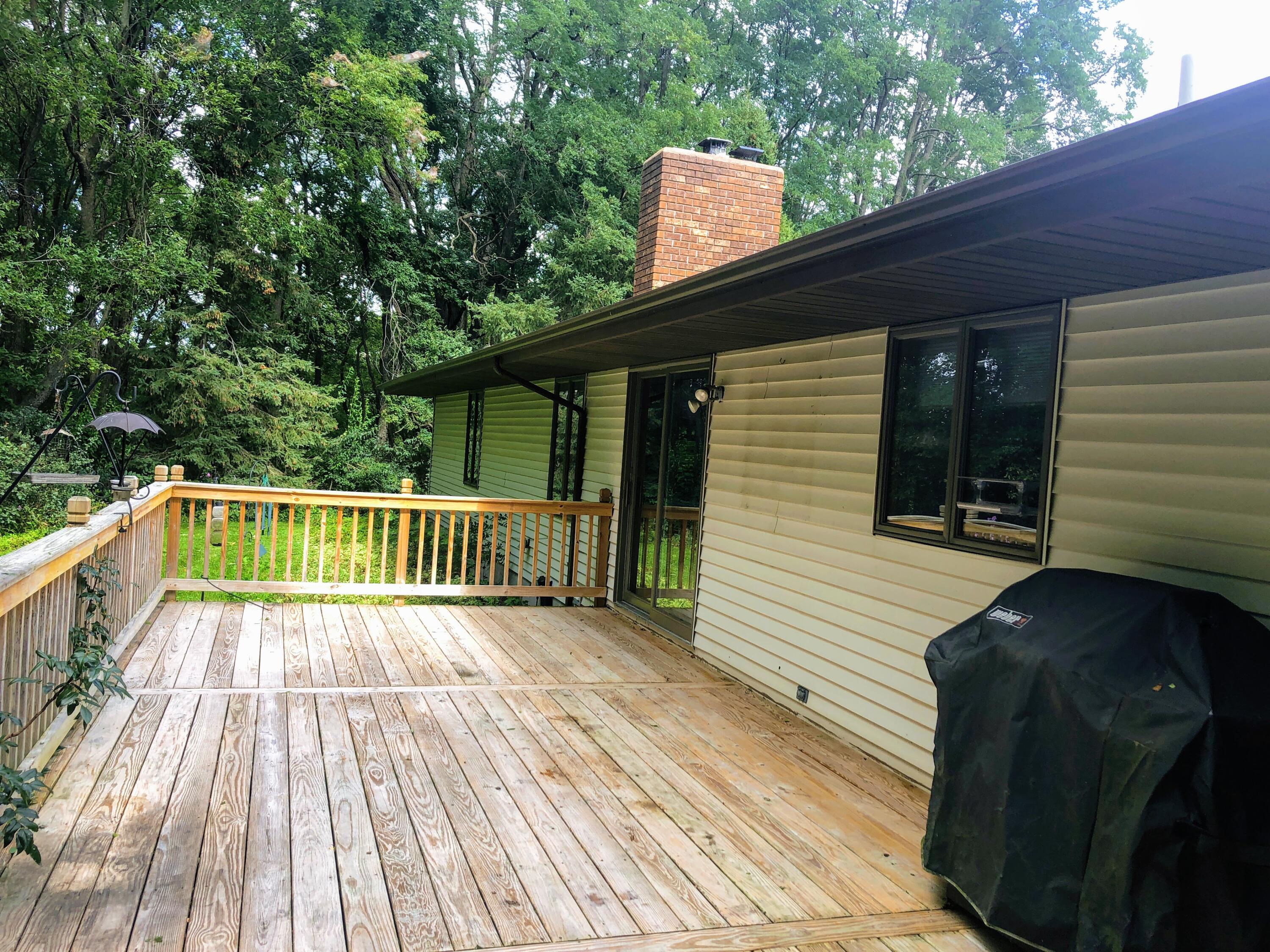 21075 1 Mile Road Reed City, MI 49677 - Photo 32 of 43 back deck