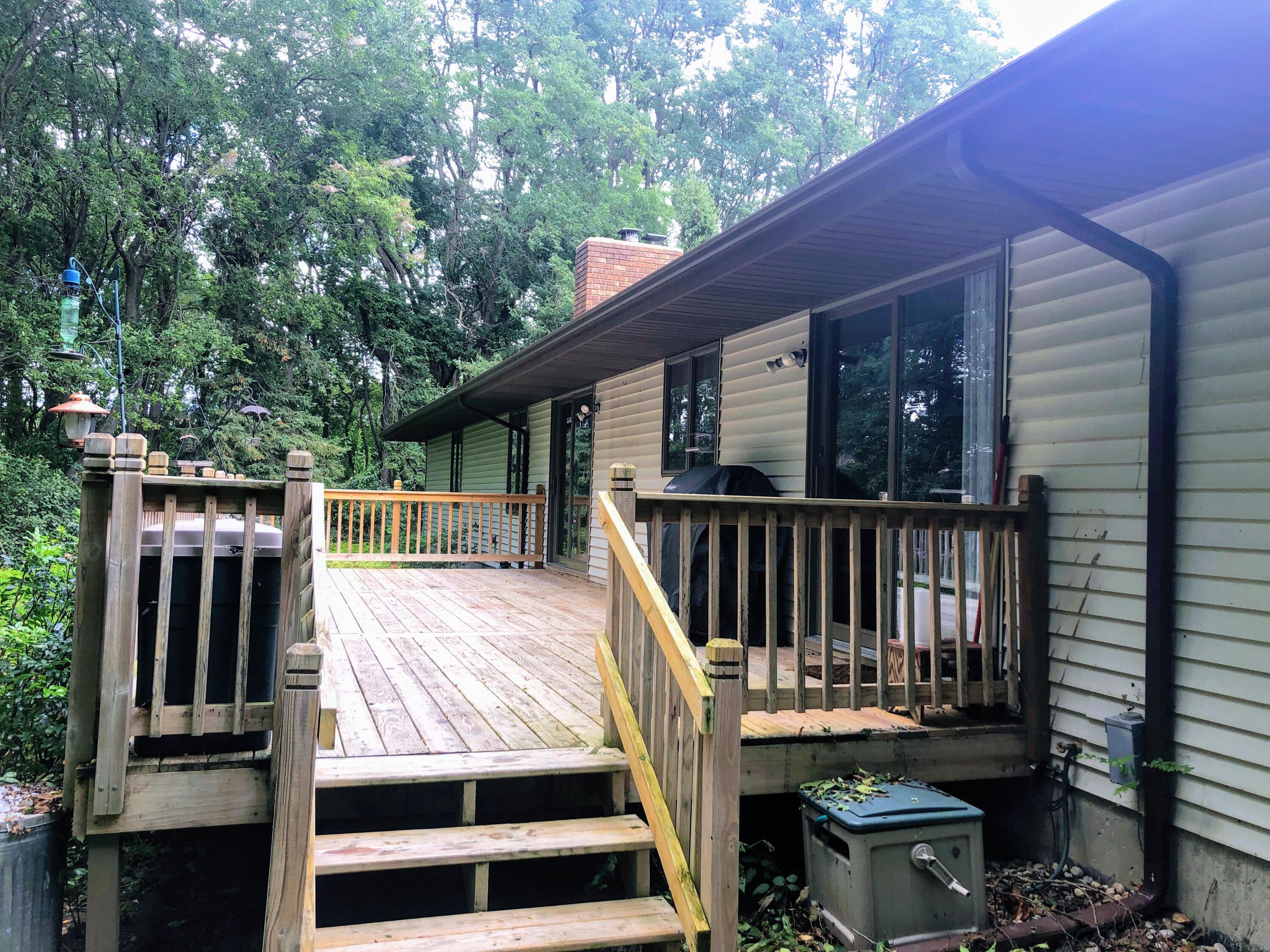 21075 1 Mile Road Reed City, MI 49677 - Photo 33 of 43 back deck