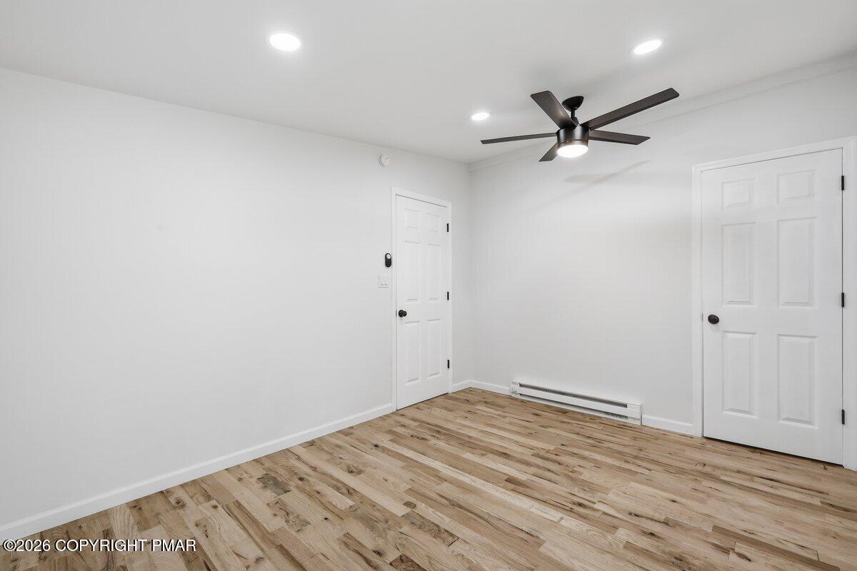 155 Blooming Grove Road Hawley, PA 18428 - Photo 29 of 41 wooden floor in an empty room