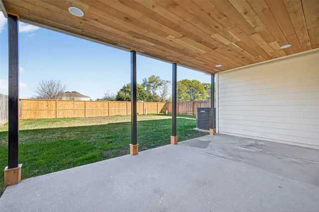 a view of a backyard with a garden and plants