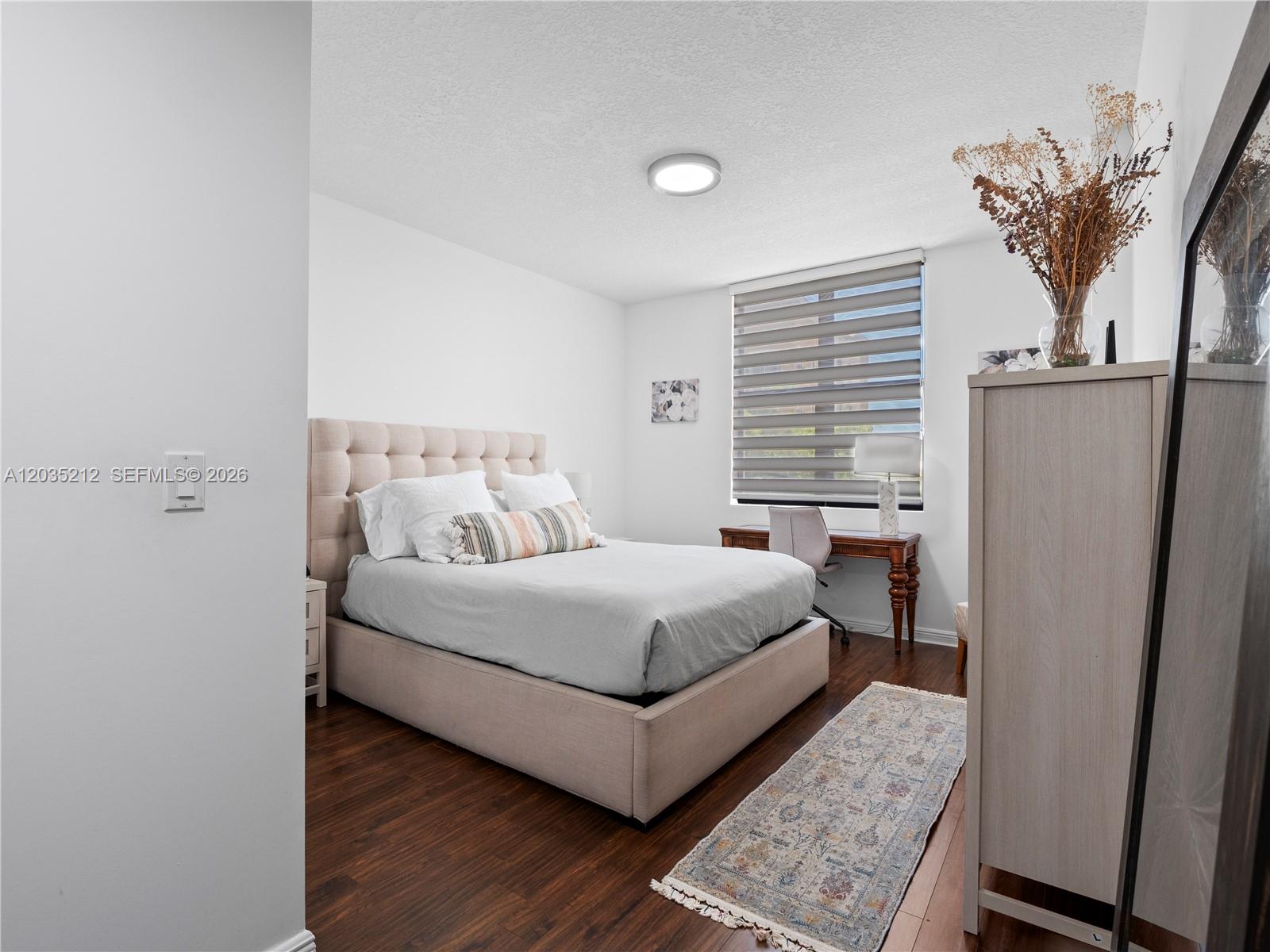 888 Douglas Road, Unit 302 Coral Gables, FL 33134 - Photo 5 of 51 MASTER BEDROOM WITH CUSTOM BUILT WALK-IN CLOSET