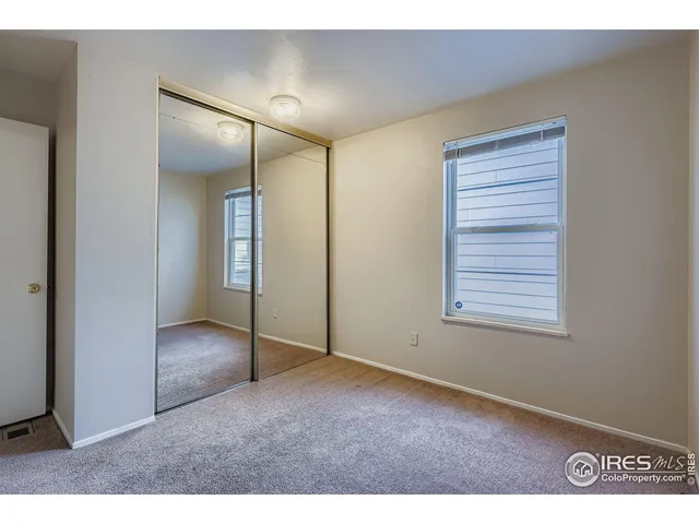 a view of an empty room with window