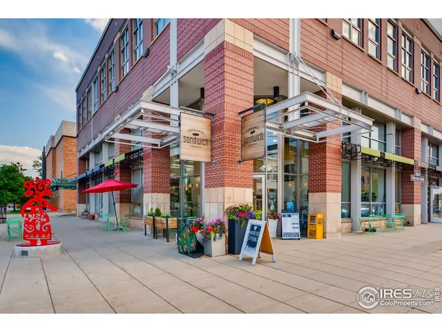 a view of street with large buildings