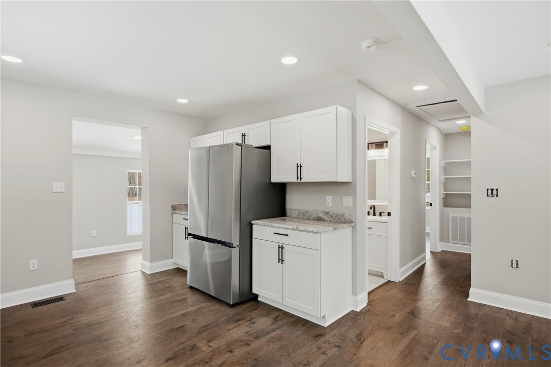 7625 Venable Road Kents Store, VA 23084 - Photo 11 of 31 a kitchen with stainless steel appliances a refrigerator and a stove top oven