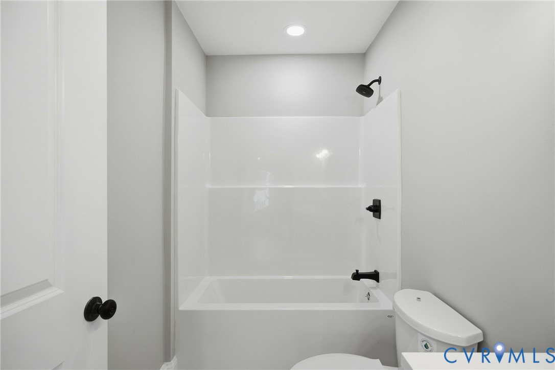 7625 Venable Road Kents Store, VA 23084 - Photo 22 of 31 a bathroom with a toilet and a shower