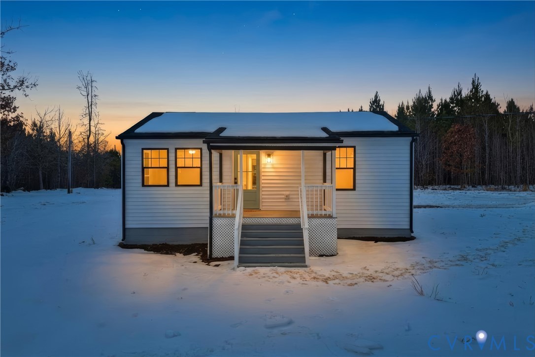 7625 Venable Road Kents Store, VA 23084 - Photo 30 of 31 a front view of a house with a yard