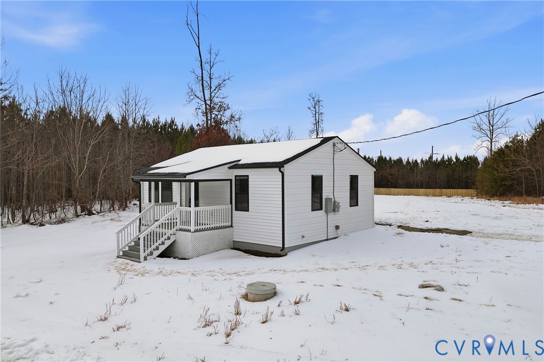 7625 Venable Road Kents Store, VA 23084 - Photo 31 of 31 a white house that has a tree in the background