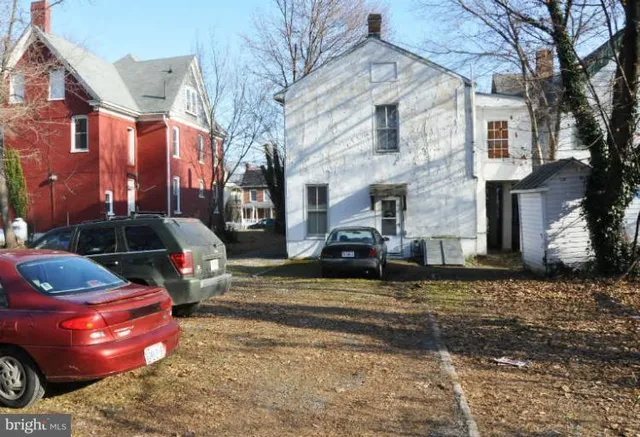 a view of a street with cars