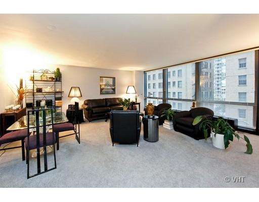 910 North Lake Shore Drive, Unit 718 Chicago, IL 60611 - Photo 3 of 10 a living room with furniture and a window