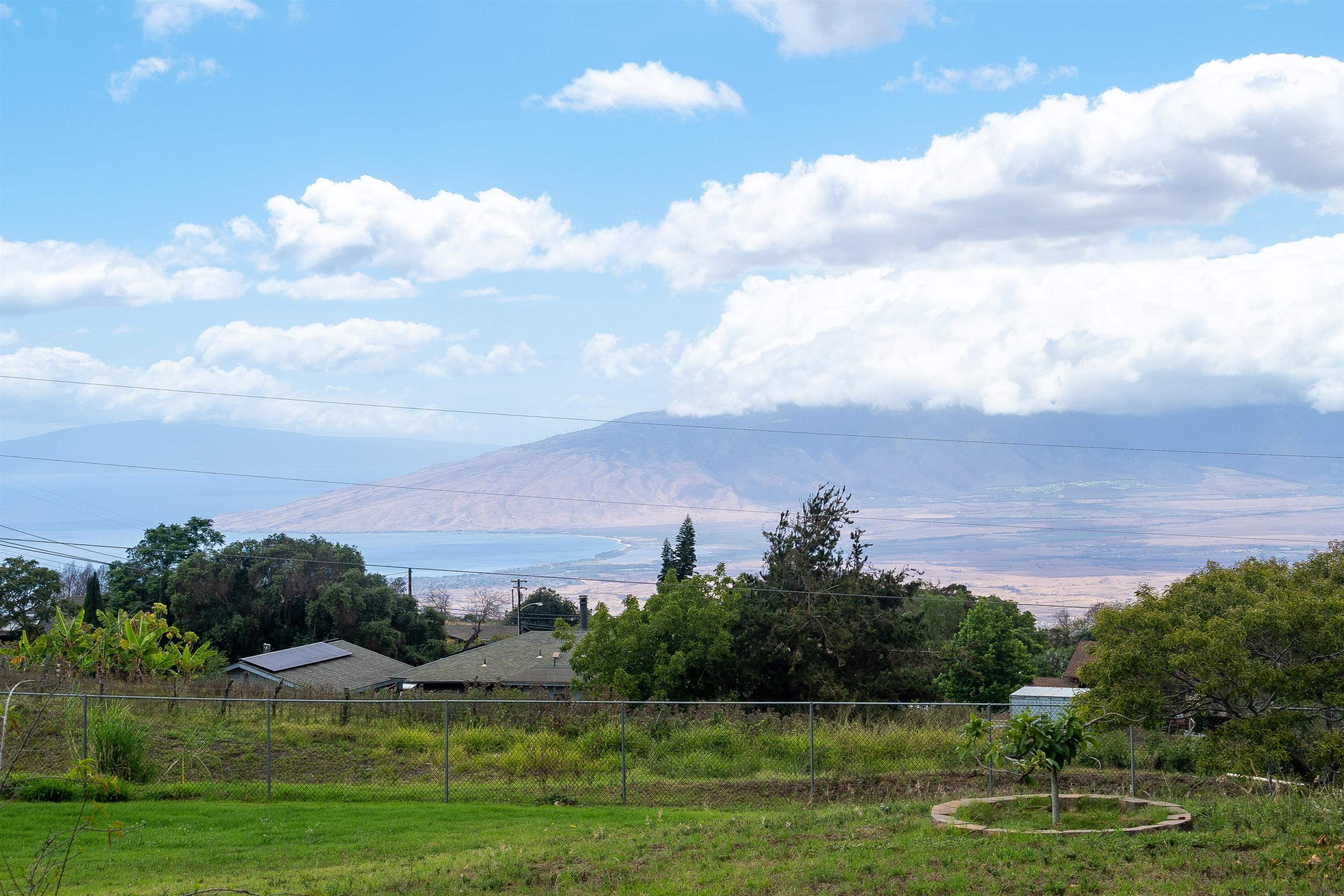 5340 Lower Kula Road Kula, HI 96790 - Photo 1 of 29 a view of a lake and a yard