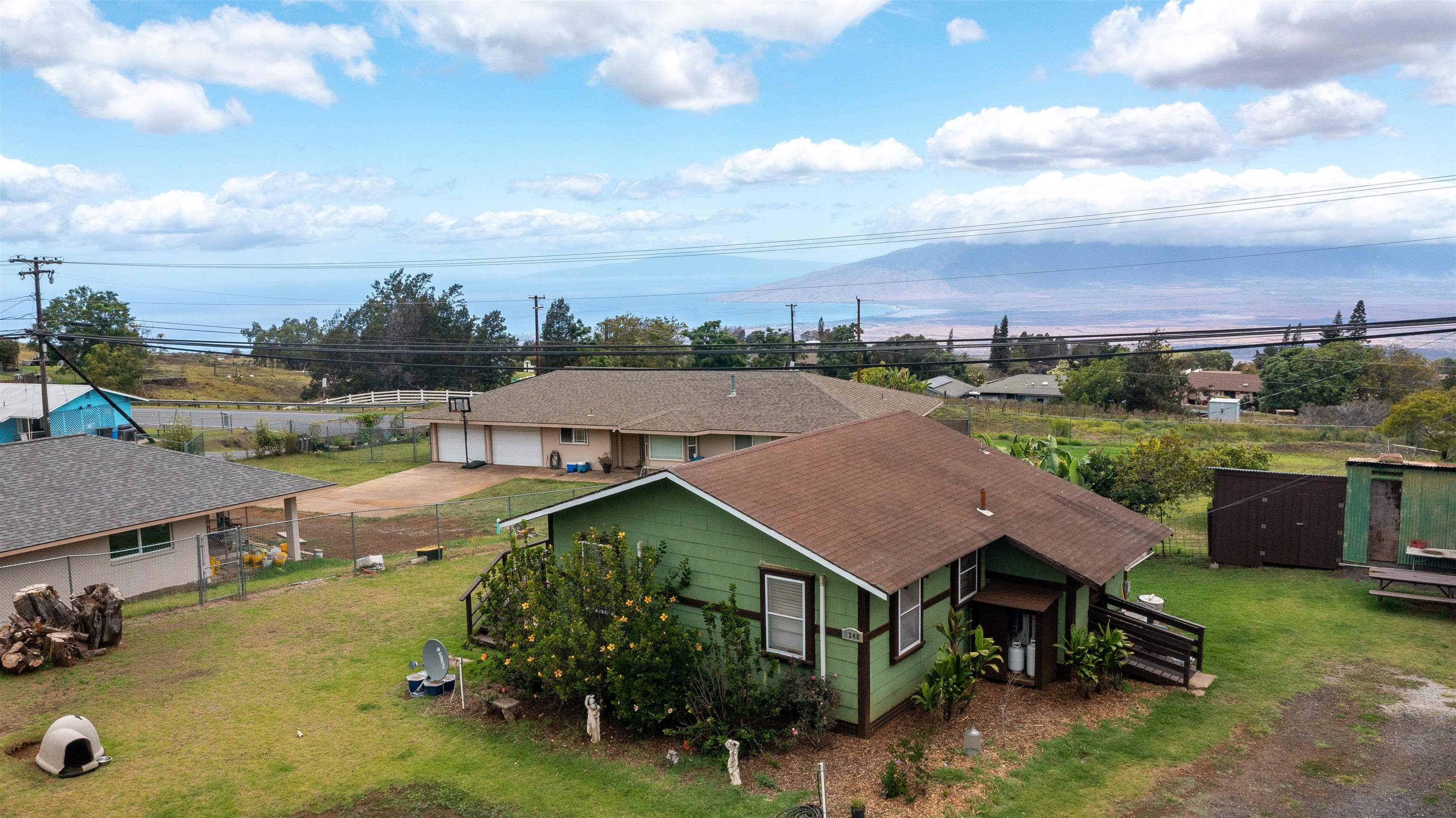 5340 Lower Kula Road Kula, HI 96790 - Photo 16 of 29 an aerial view of a house with pool garden and furniture