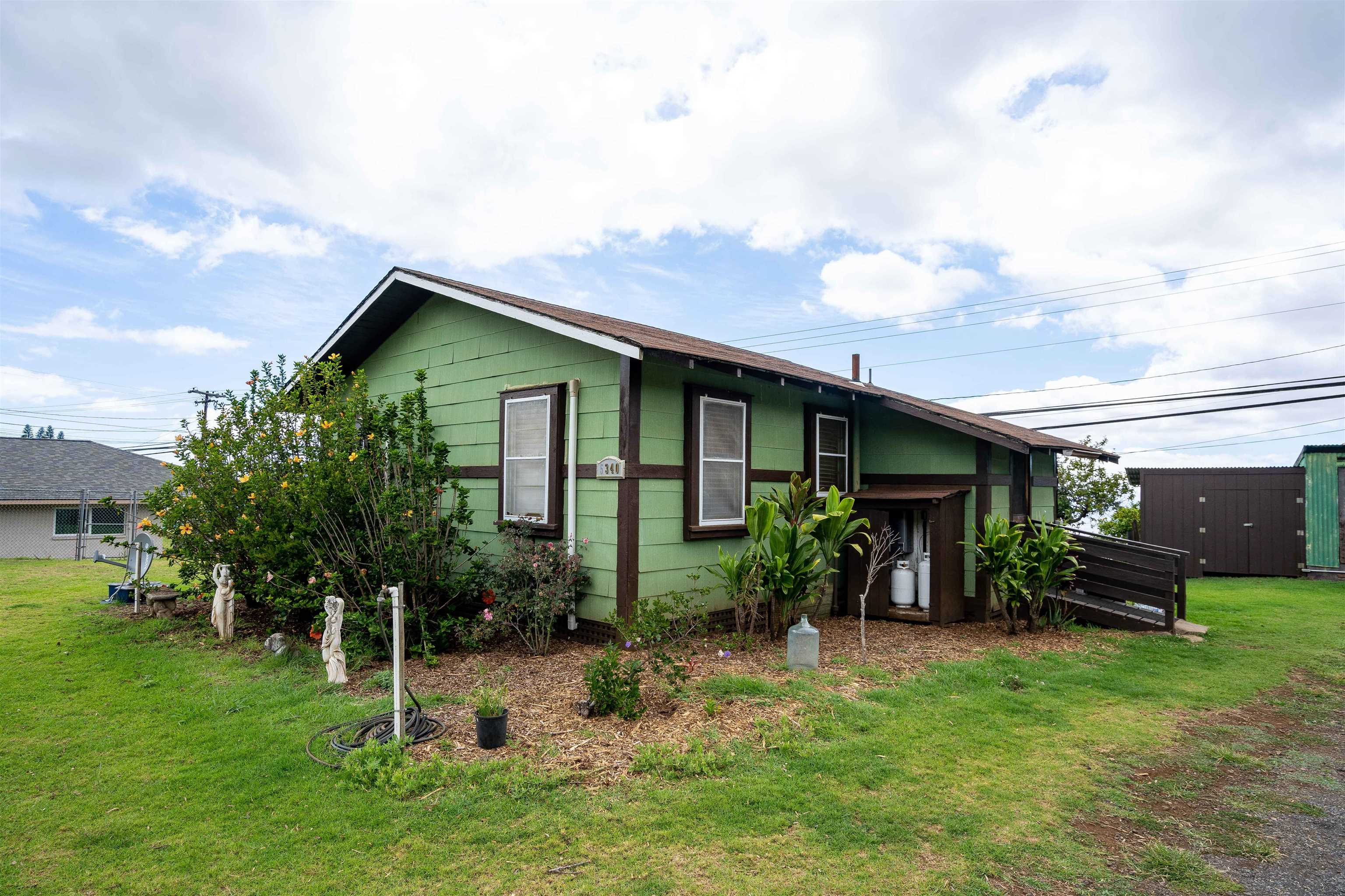 5340 Lower Kula Road Kula, HI 96790 - Photo 2 of 29 a view of house with a yard