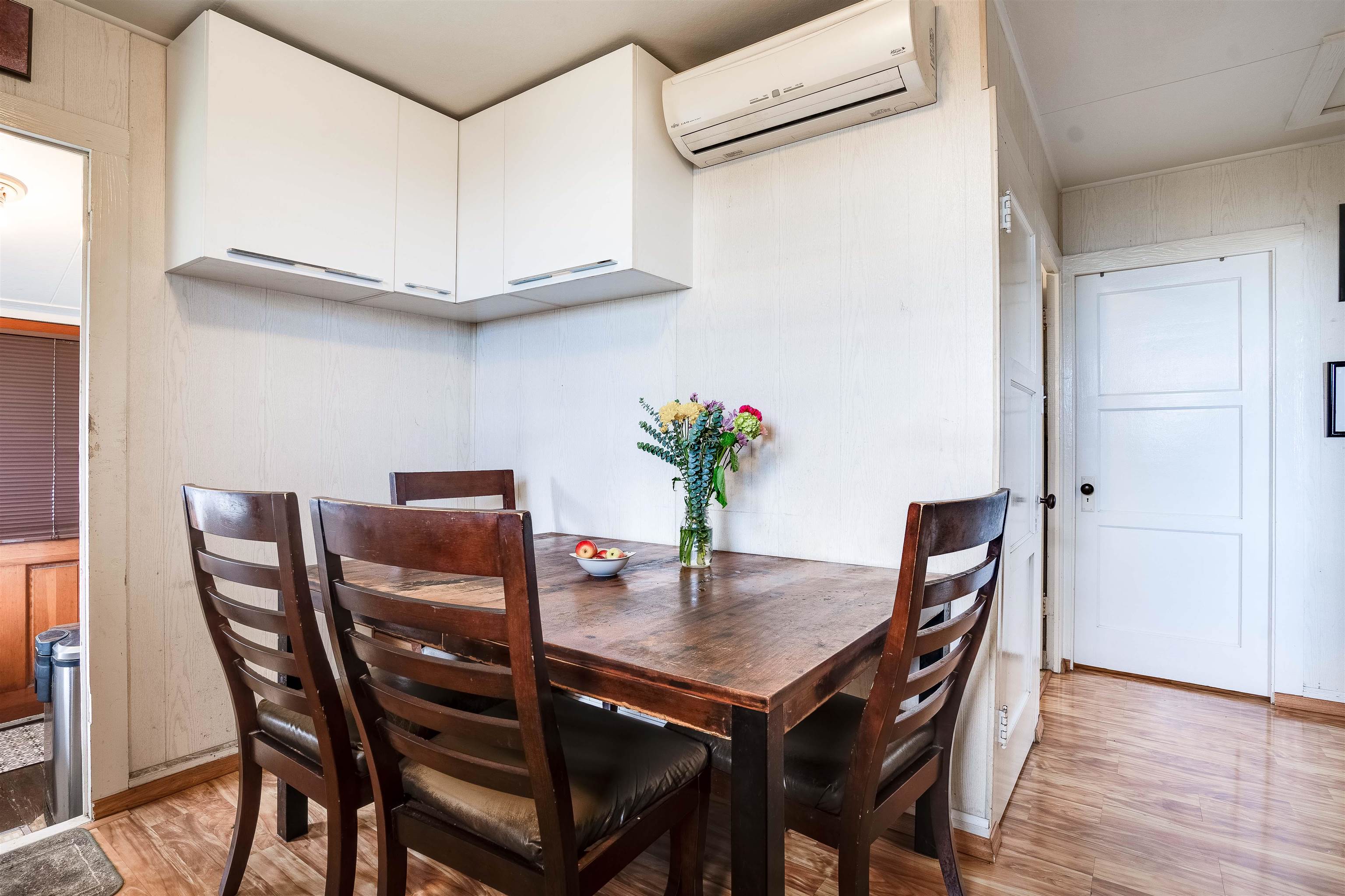 5340 Lower Kula Road Kula, HI 96790 - Photo 7 of 29 a view of a dining room with furniture and wooden floor