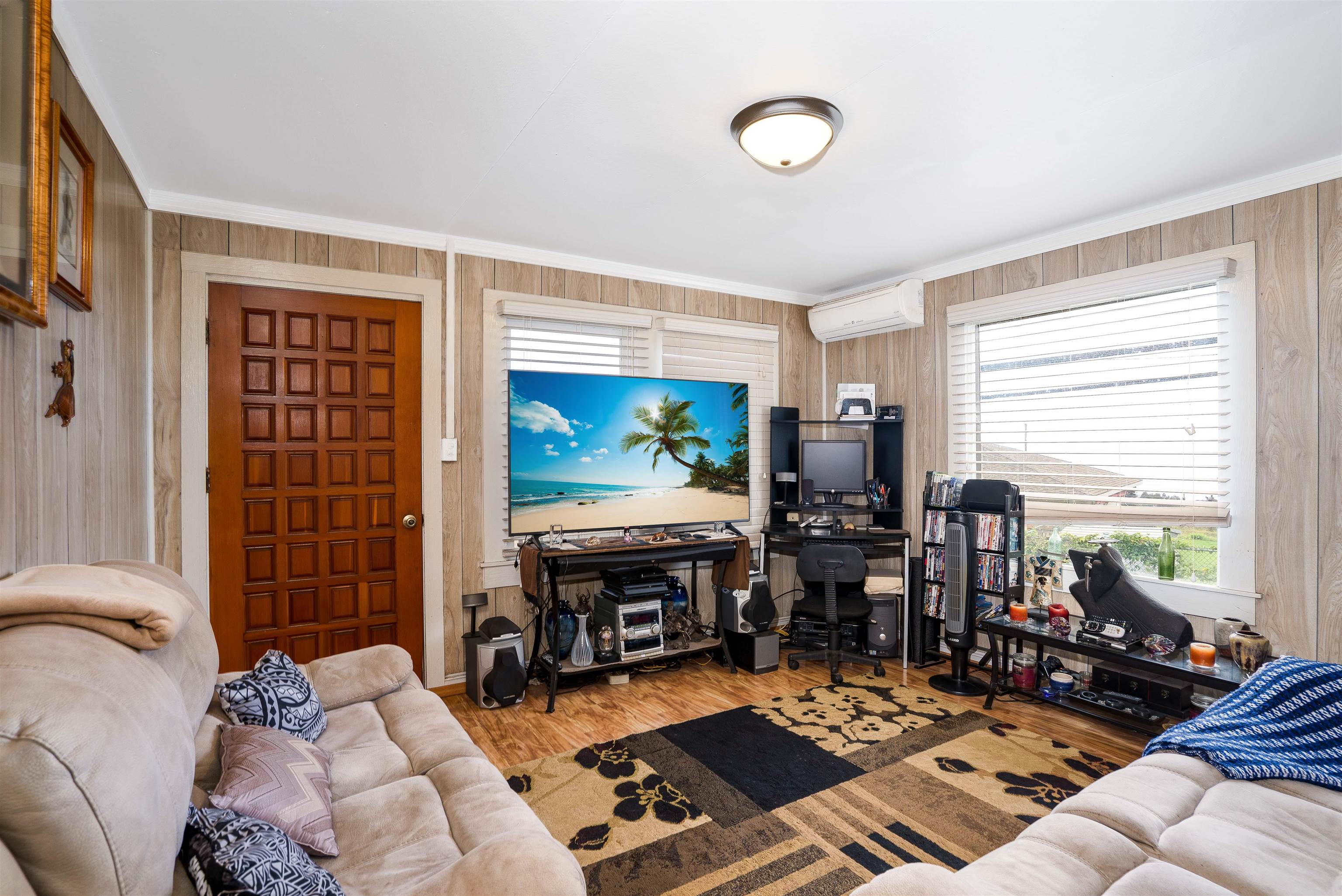5340 Lower Kula Road Kula, HI 96790 - Photo 9 of 29 a living room with fireplace furniture and a flat screen tv