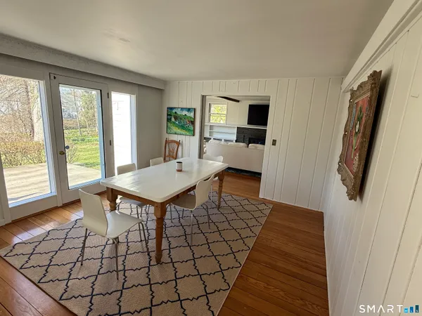 a view of a livingroom with furniture and wooden floor