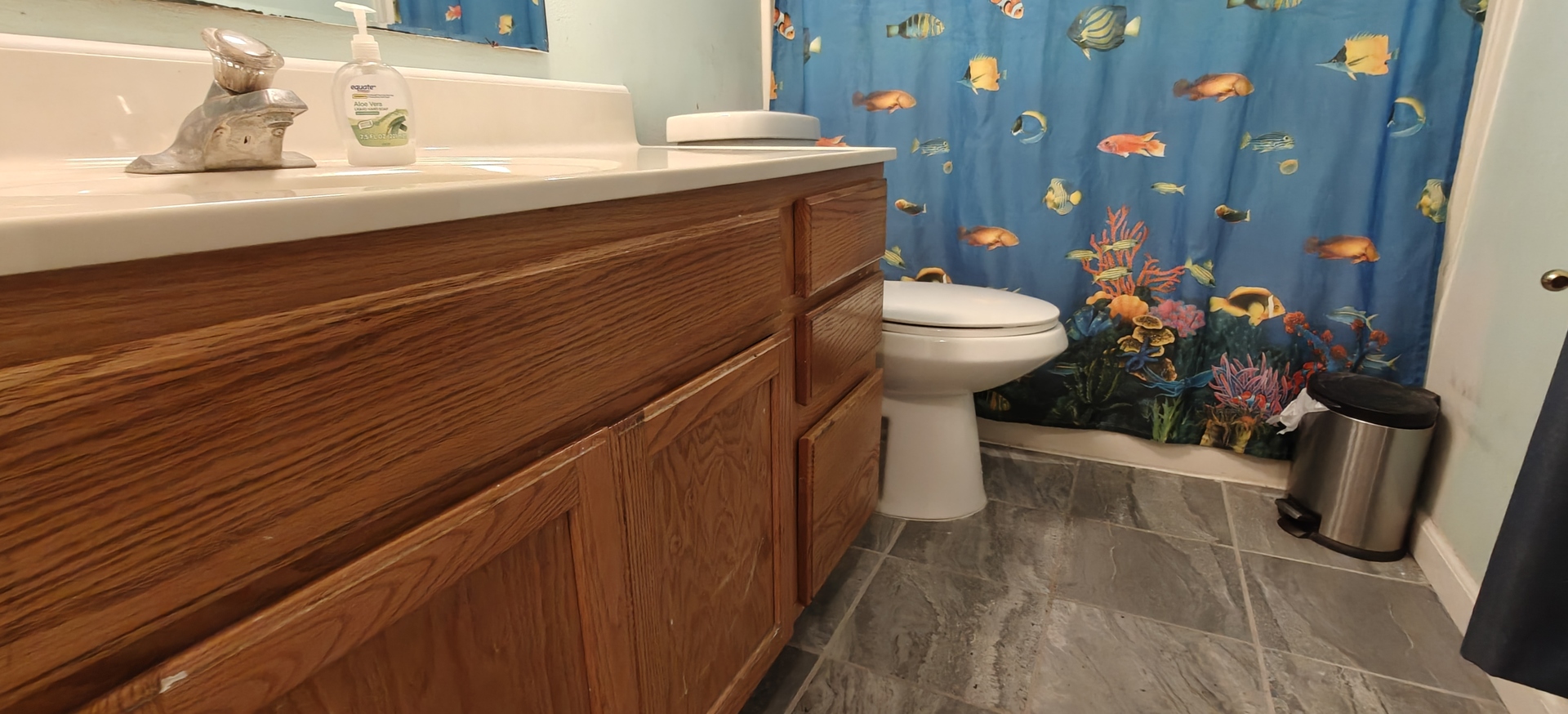 4515 Raven Street Rockford, IL 61107 - Photo 14 of 22 a bathroom with a sink and toilet