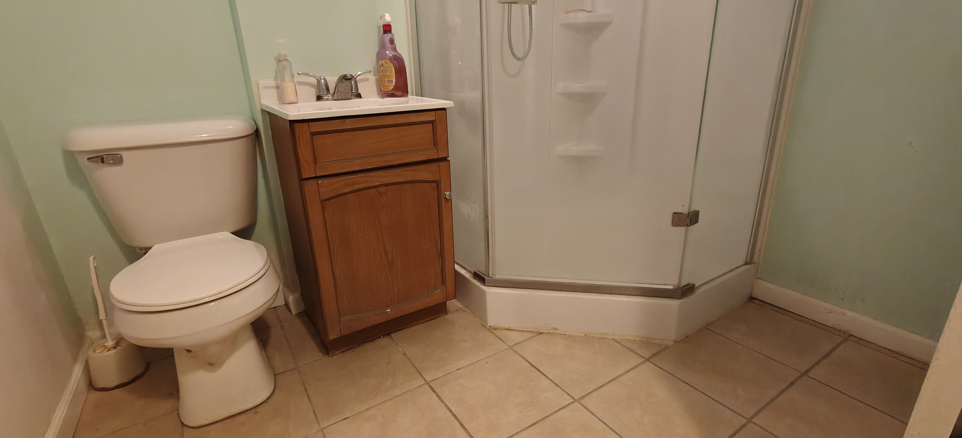 4515 Raven Street Rockford, IL 61107 - Photo 20 of 22 a bathroom with a toilet and a sink