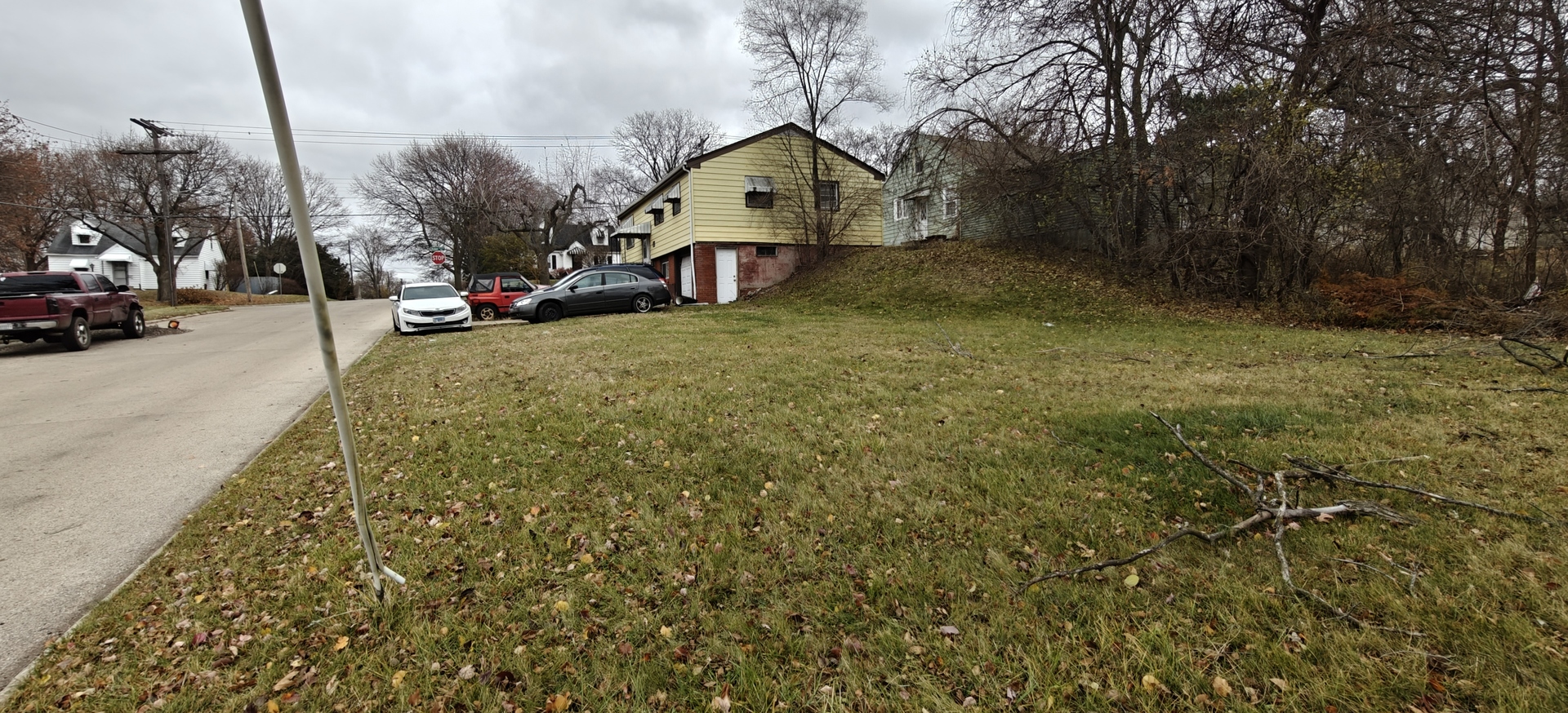 4515 Raven Street Rockford, IL 61107 - Photo 2 of 22 a view of a street with houses