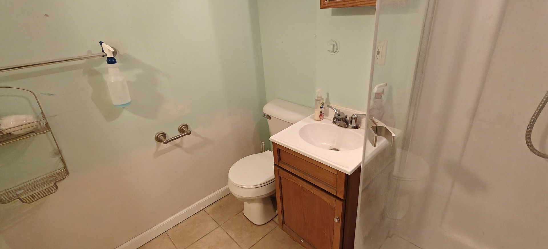 4515 Raven Street Rockford, IL 61107 - Photo 21 of 22 a bathroom with a sink toilet and shower