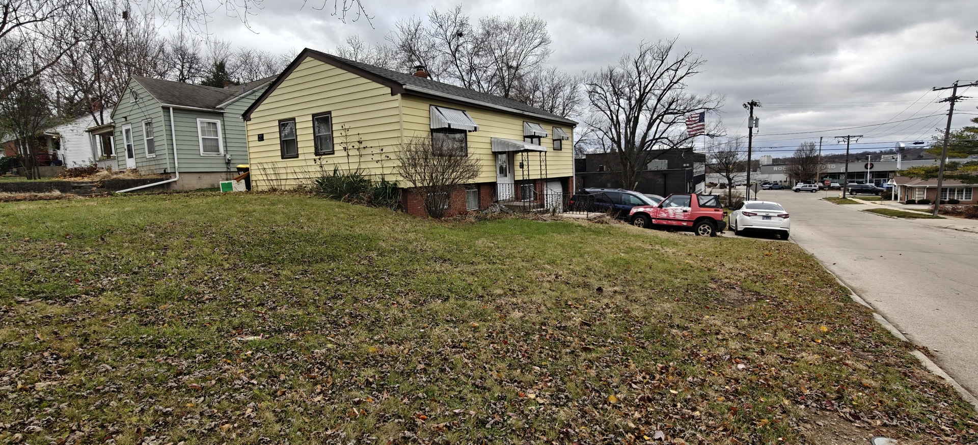 4515 Raven Street Rockford, IL 61107 - Photo 4 of 22 a view of a house with a yard
