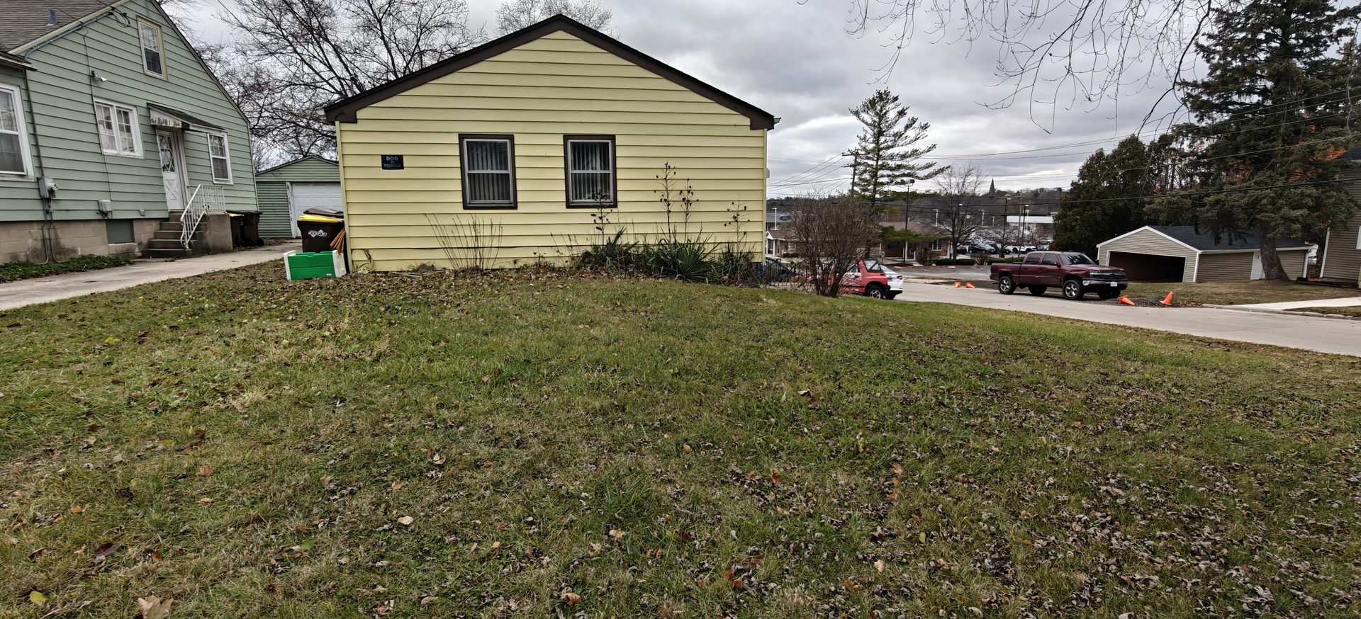 4515 Raven Street Rockford, IL 61107 - Photo 5 of 22 a front view of a house with a yard