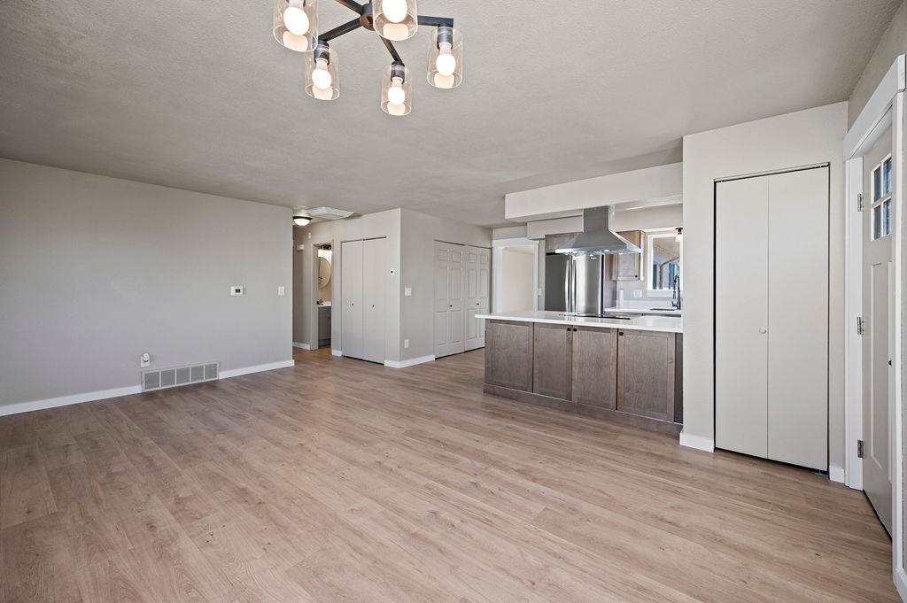 508 Rosa Street Palisade, CO 81526 - Photo 3 of 18 a view of a kitchen with a sink and refrigerator