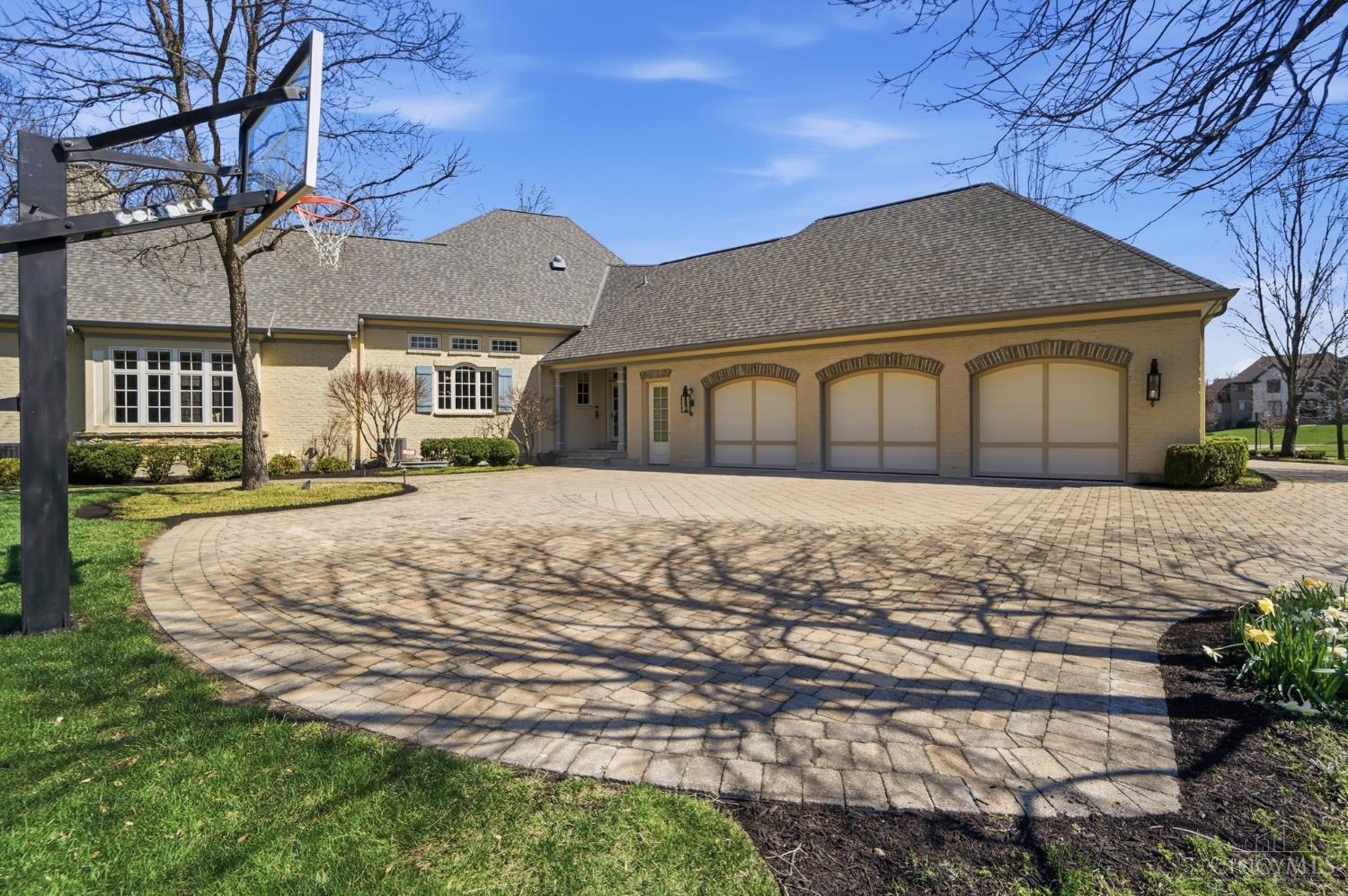 1054 Observatory Point Maineville, OH 45039 - Photo 73 of 82 View of the rear of the house and 3 car garage.