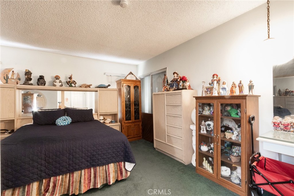 26218 McCall Boulevard Menifee, CA 92586 - Photo 20 of 33 a bed room with a bed and a window