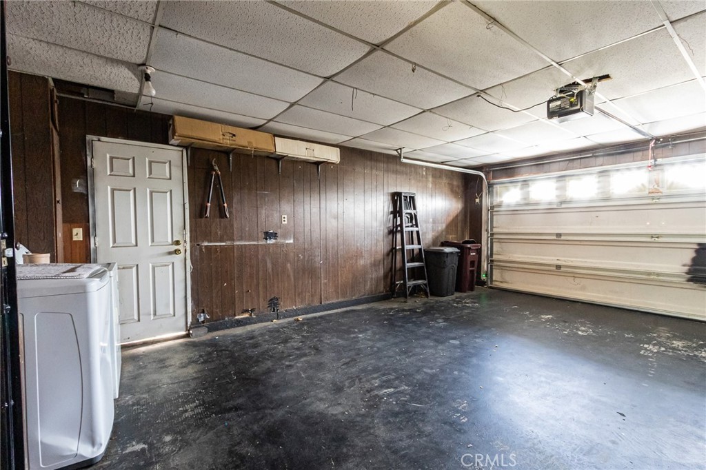 26218 McCall Boulevard Menifee, CA 92586 - Photo 31 of 33 a view of an empty room with a projector