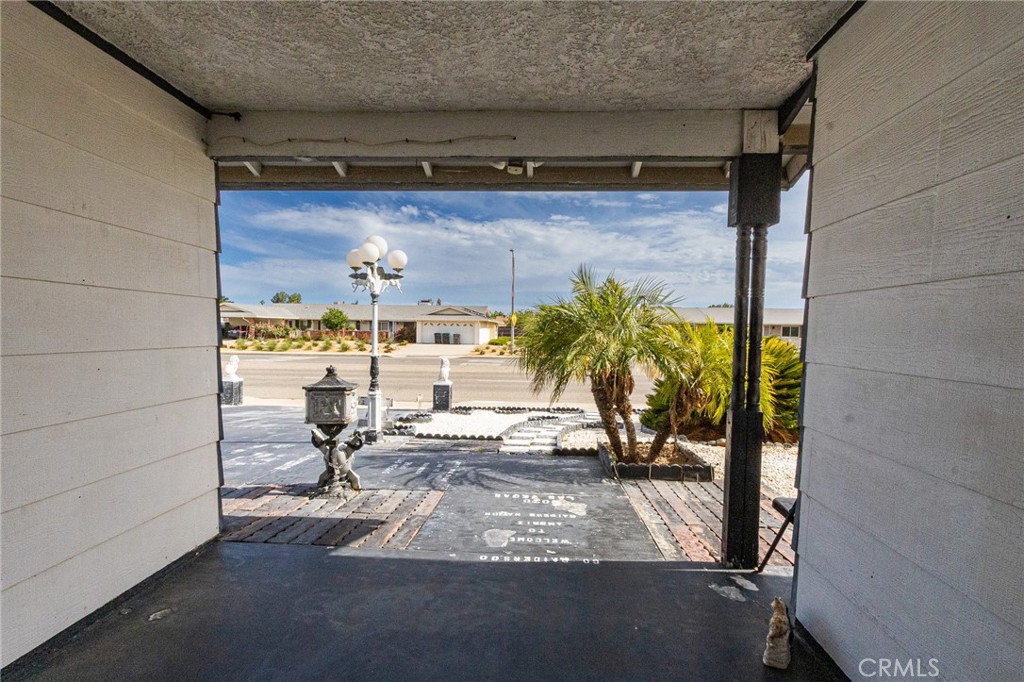 26218 McCall Boulevard Menifee, CA 92586 - Photo 7 of 33 a view of balcony with chair and table