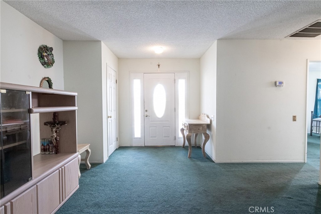 26218 McCall Boulevard Menifee, CA 92586 - Photo 9 of 33 a view of entryway with workspace and window