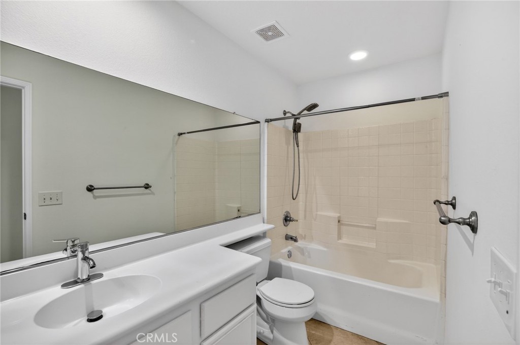 80601 Declaration Avenue Indio, CA 92201 - Photo 14 of 15 a bathroom with a sink toilet and shower