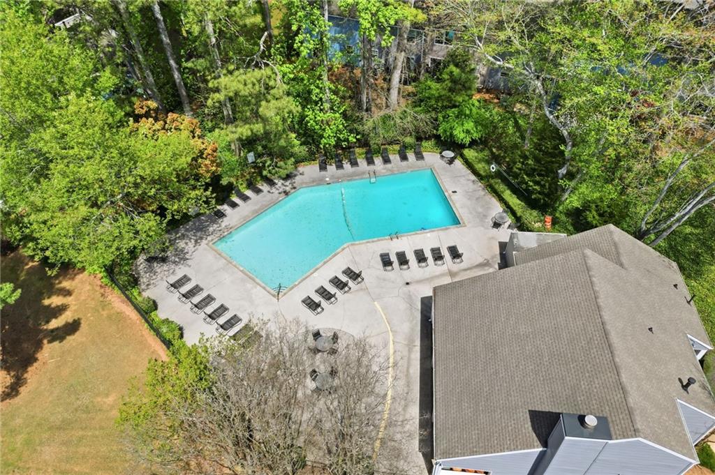 393 Promenade Court Marietta, GA 30064 - Photo 32 of 42 an aerial view of a backyard with swimming pool