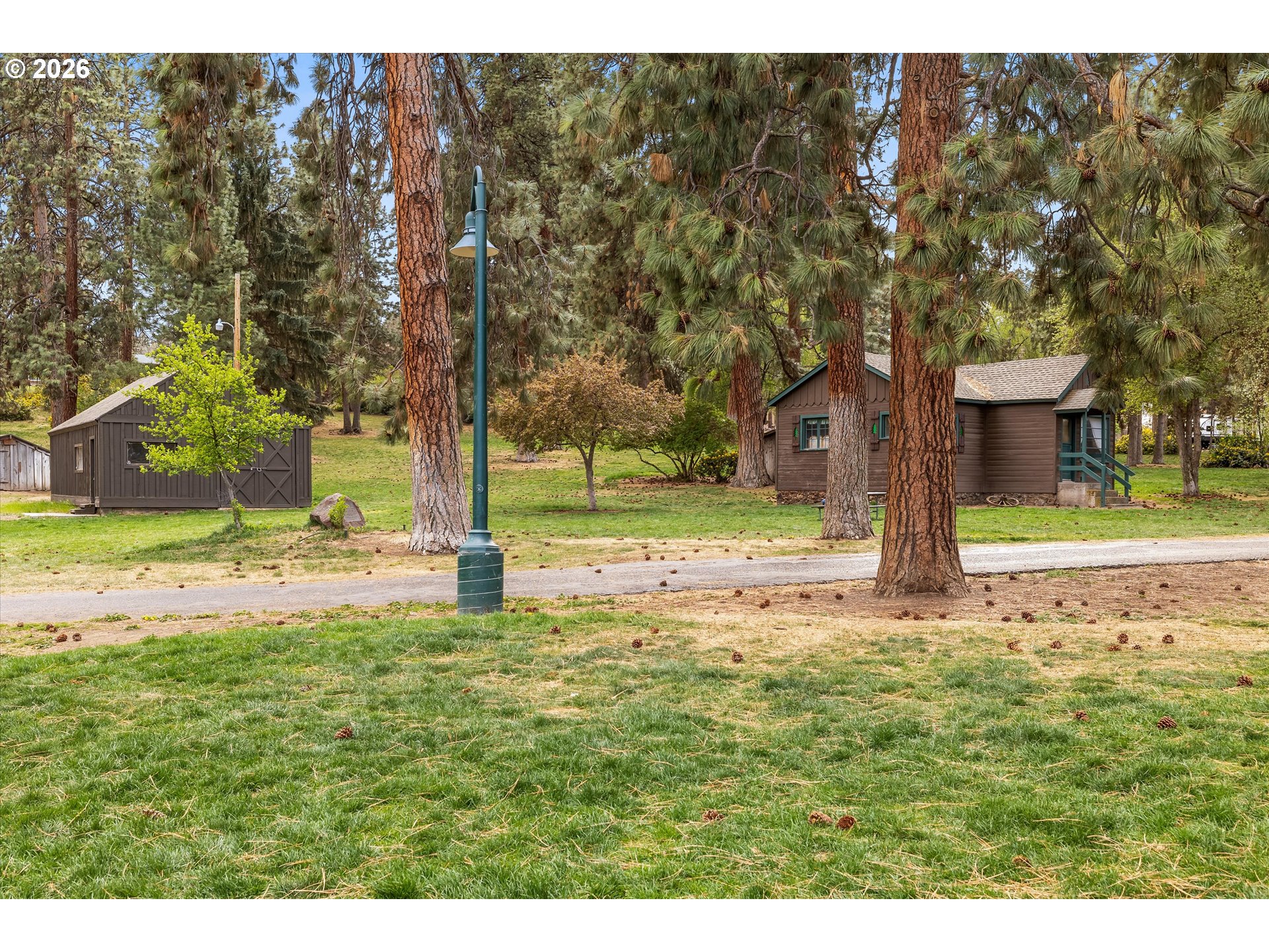 2407 Northeast Libby Place Bend, OR 97701 - Photo 22 of 23 a swimming pool with outdoor seating and yard