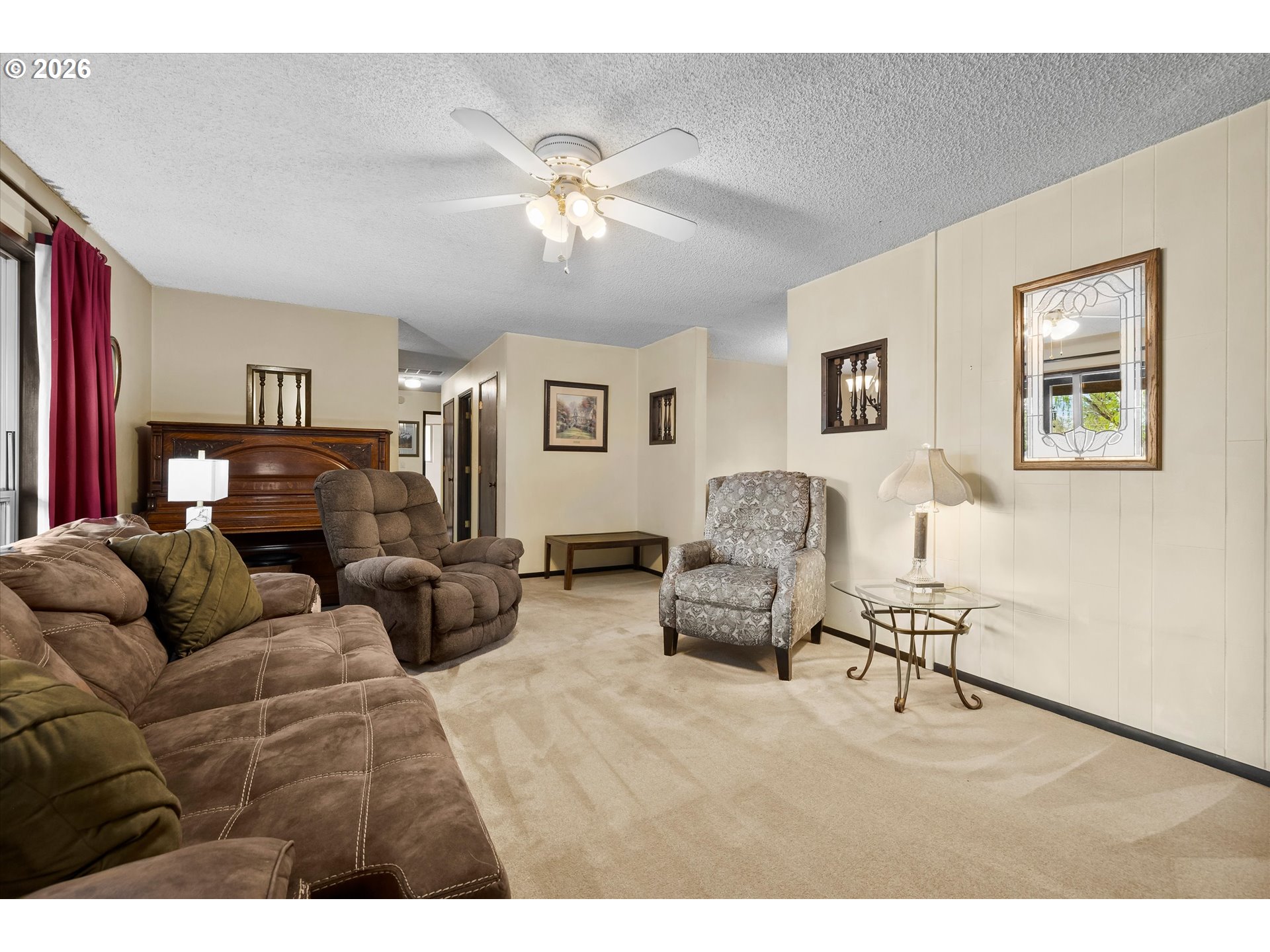 2407 Northeast Libby Place Bend, OR 97701 - Photo 3 of 23 a living room with furniture and a flat screen tv