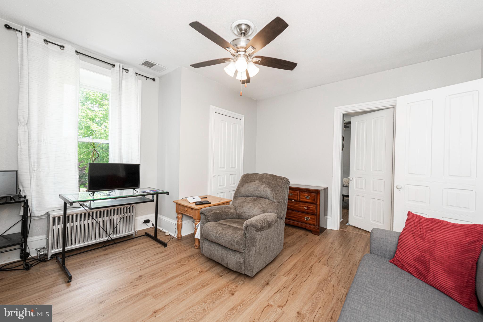 57 Longview Road Royersford, PA 19468 - Photo 24 of 53 a living room with furniture and a flat screen tv
