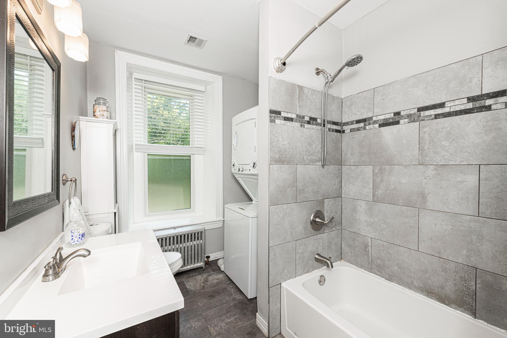 57 Longview Road Royersford, PA 19468 - Photo 26 of 53 a bathroom with a tub a sink and a window