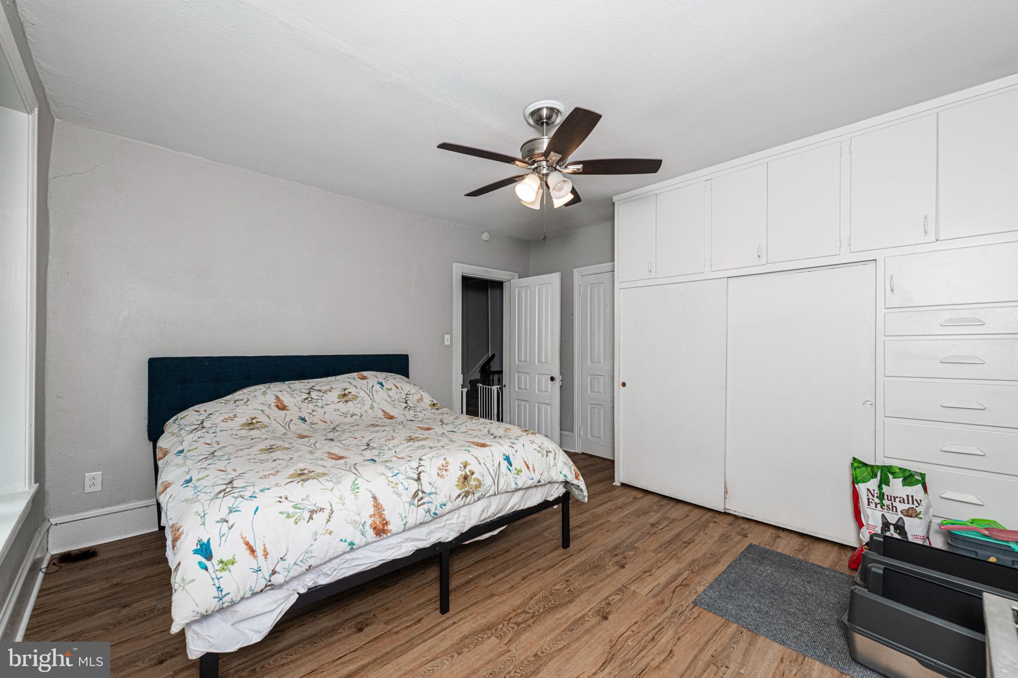 57 Longview Road Royersford, PA 19468 - Photo 29 of 53 a bedroom with a bed a dresser with wooden floor
