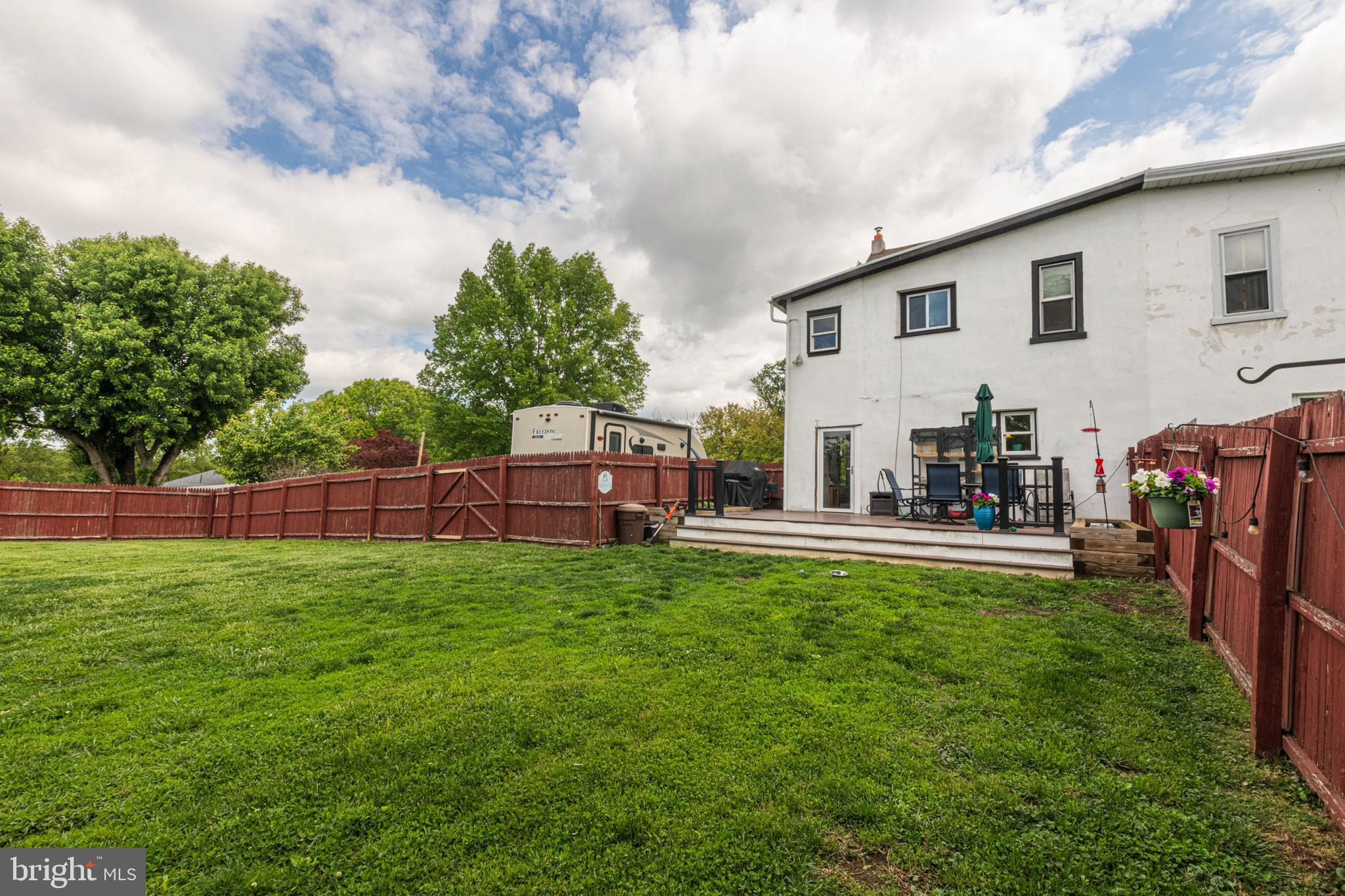 57 Longview Road Royersford, PA 19468 - Photo 41 of 53 a backyard of a house with table and chairs