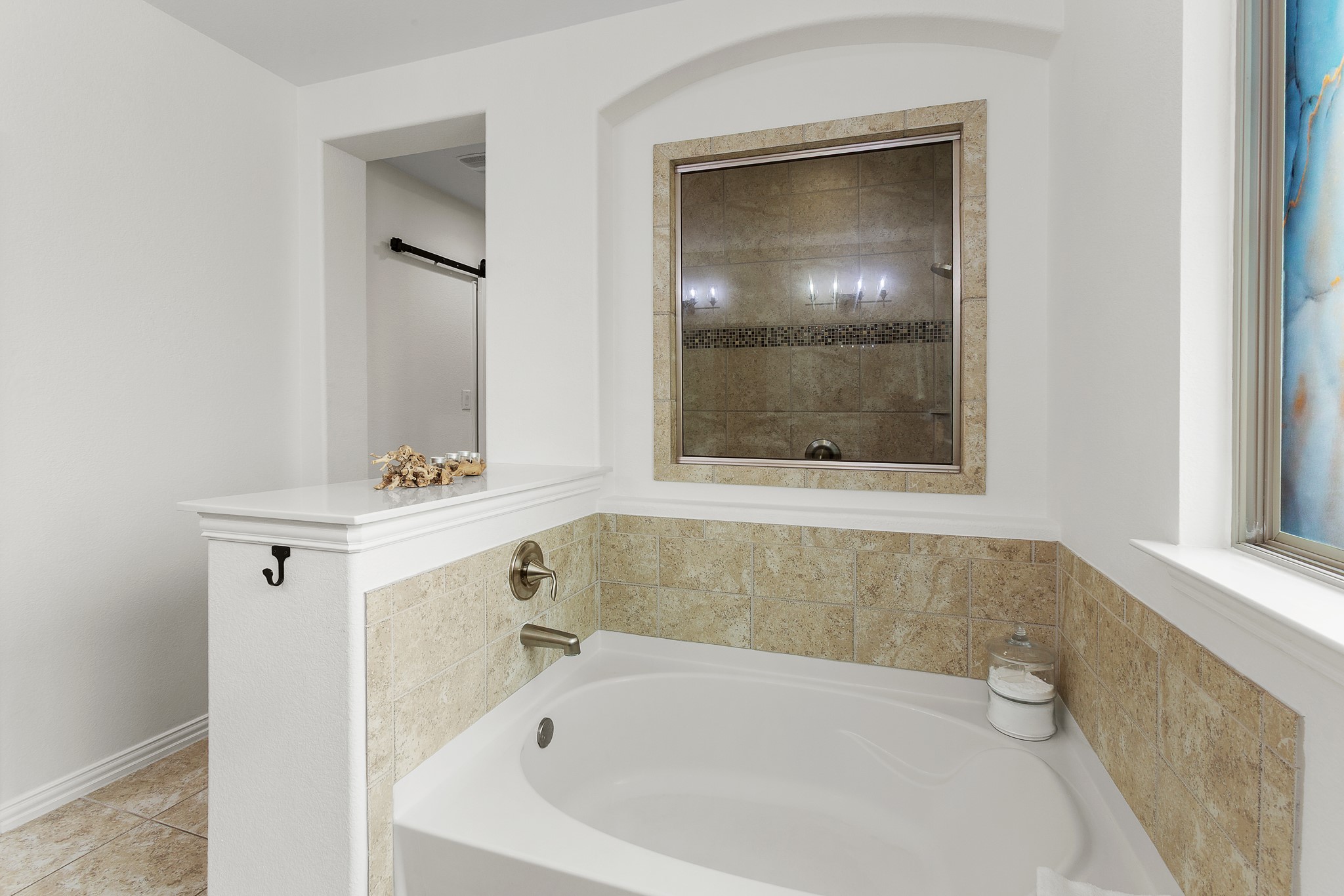7613 Turnback Ledge Trail Lago Vista, TX 78645 - Photo 11 of 40 a white bath tub sitting next to a white sink