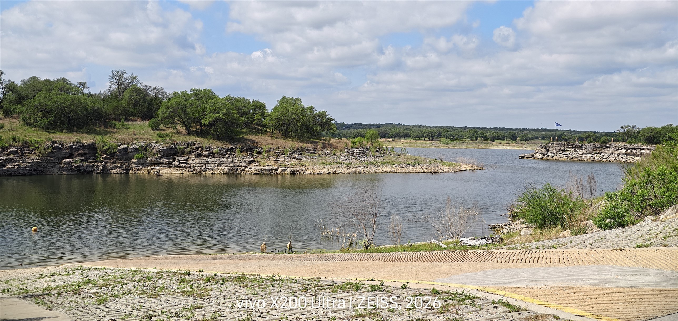 7613 Turnback Ledge Trail Lago Vista, TX 78645 - Photo 30 of 40 a view of a lake with a city view