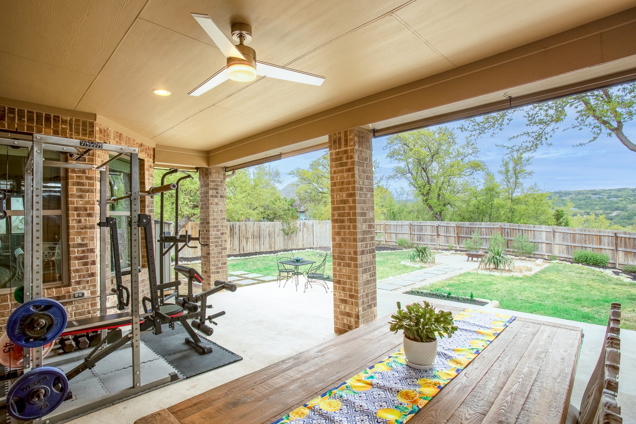 7613 Turnback Ledge Trail Lago Vista, TX 78645 - Photo 3 of 40 a room with furniture and a large window