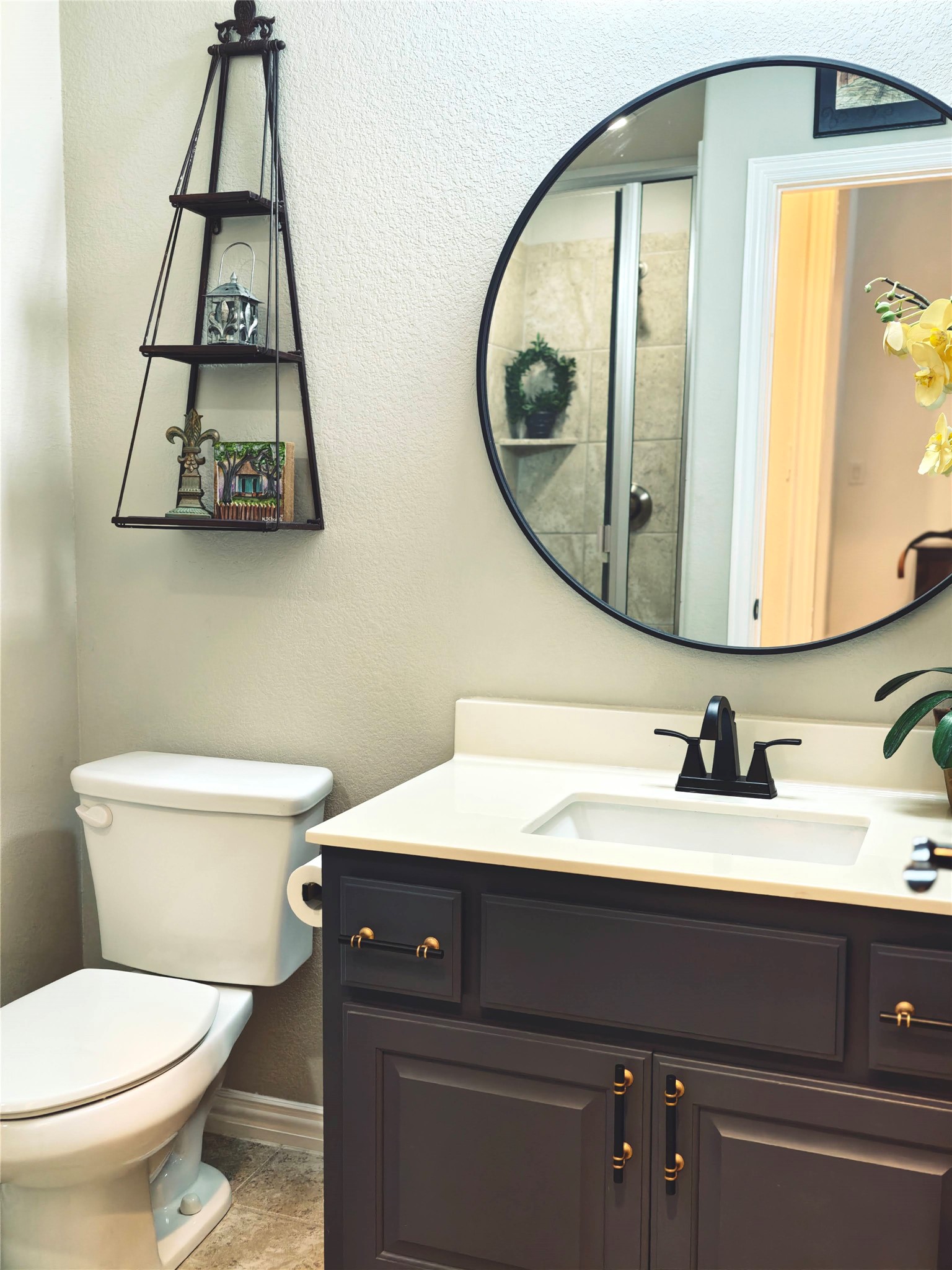7613 Turnback Ledge Trail Lago Vista, TX 78645 - Photo 37 of 40 a bathroom with a sink and a mirror