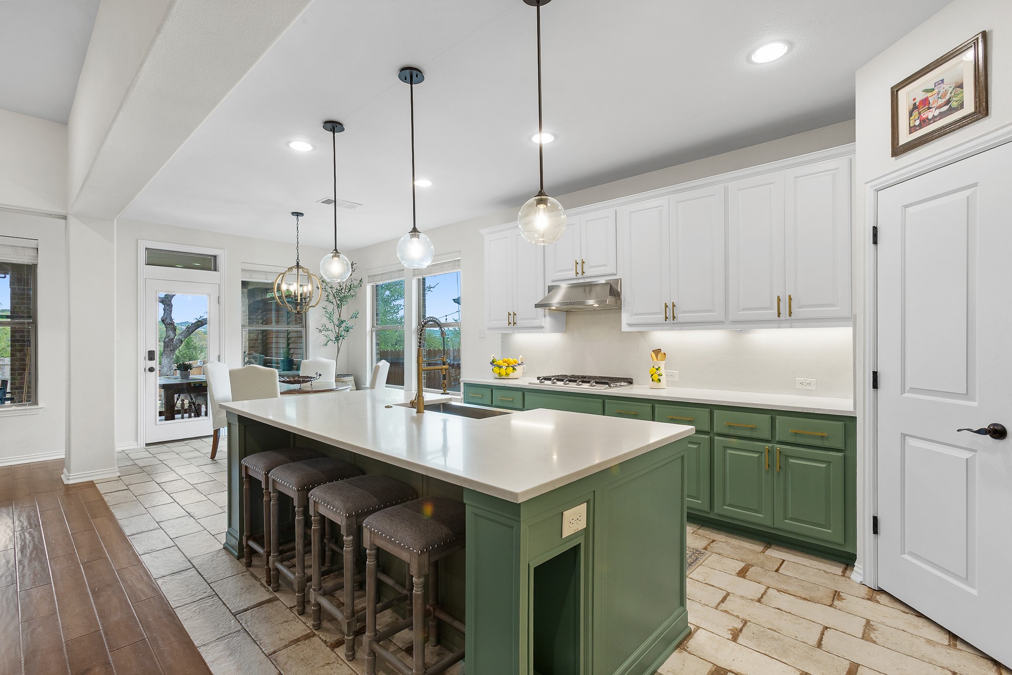 7613 Turnback Ledge Trail Lago Vista, TX 78645 - Photo 6 of 40 a kitchen with counter top space cabinets and appliances